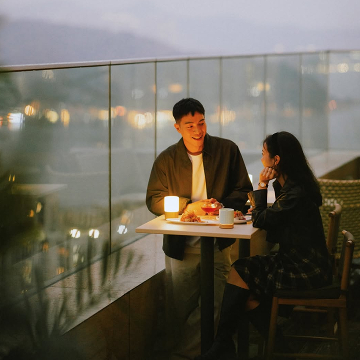 Best Rooftop Bars In Hong Kong: Sugar at East HK, couple on the rooftop bar
