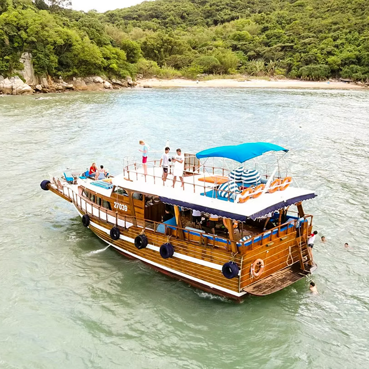 best junk boats to hire in hong kong: orange tree cruises offers junk day trips and evening harbour crusies