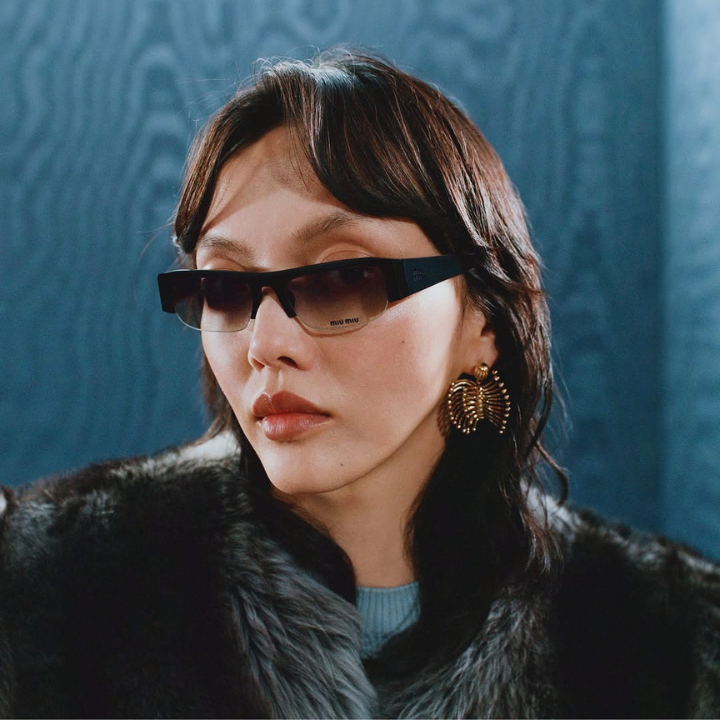 asian woman wearing miu miu sunglasses from puyi optical