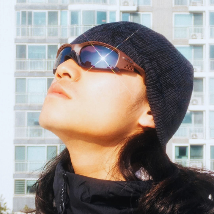 asian man wearing oakley sunglasses